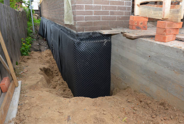 Happy homeowners after waterproofing job in Rochelle Park